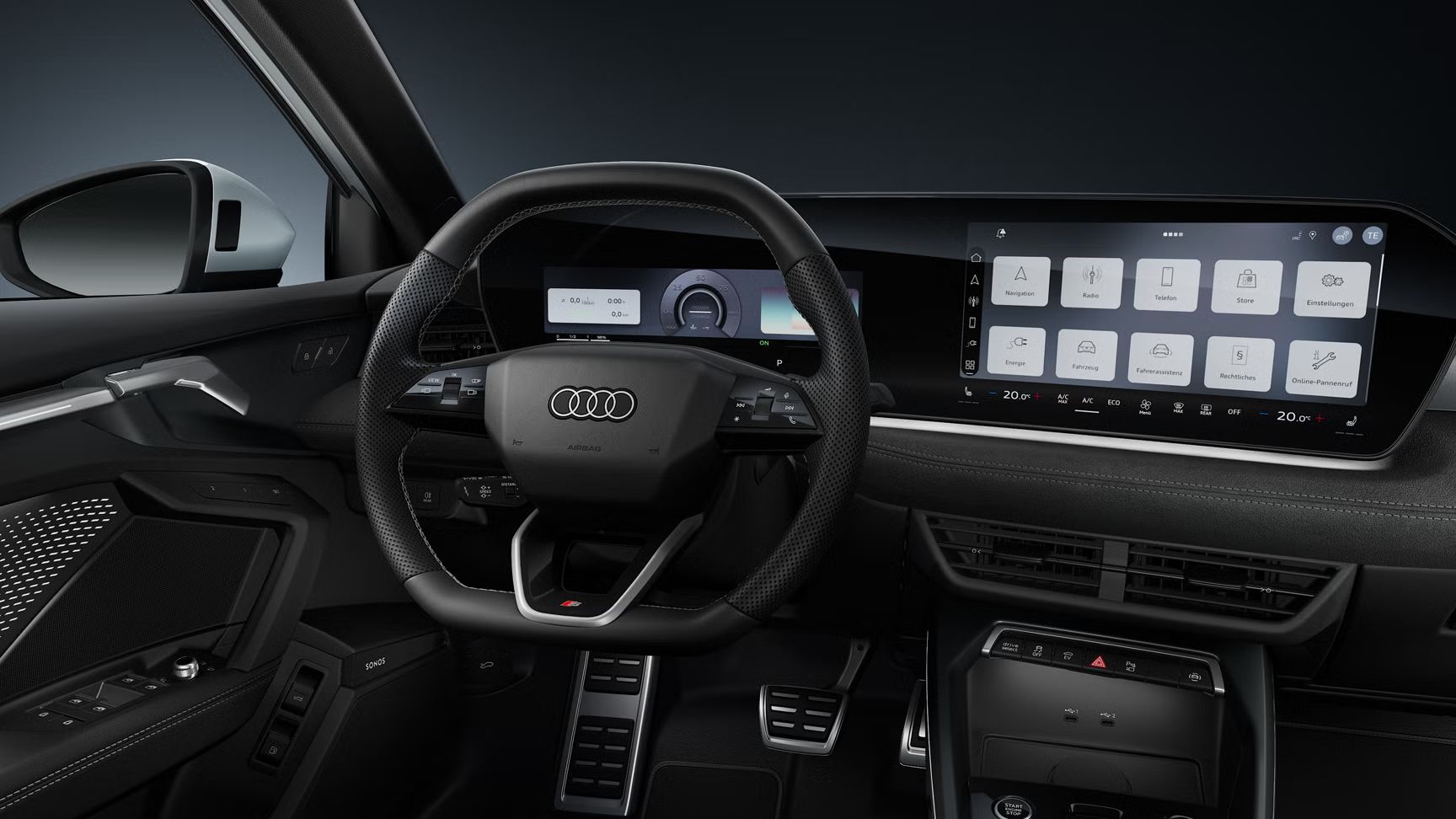 Blick auf das Cockpit mit Fokus auf das Sportlederlenkrad und das geschwungene Panoramadisplay.